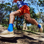 Unisex Blue Performance Running Socks on Model