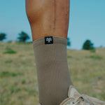 Runner wearing the Fractel V-LYONS Performance Crew Socks